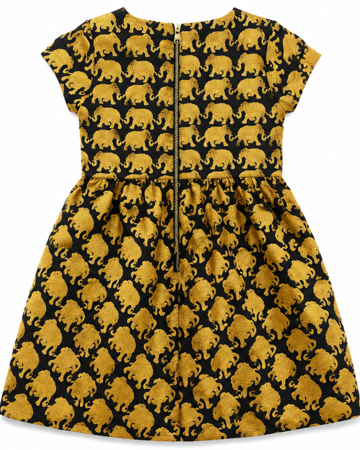 Dress with gold elephant pattern on a black background
