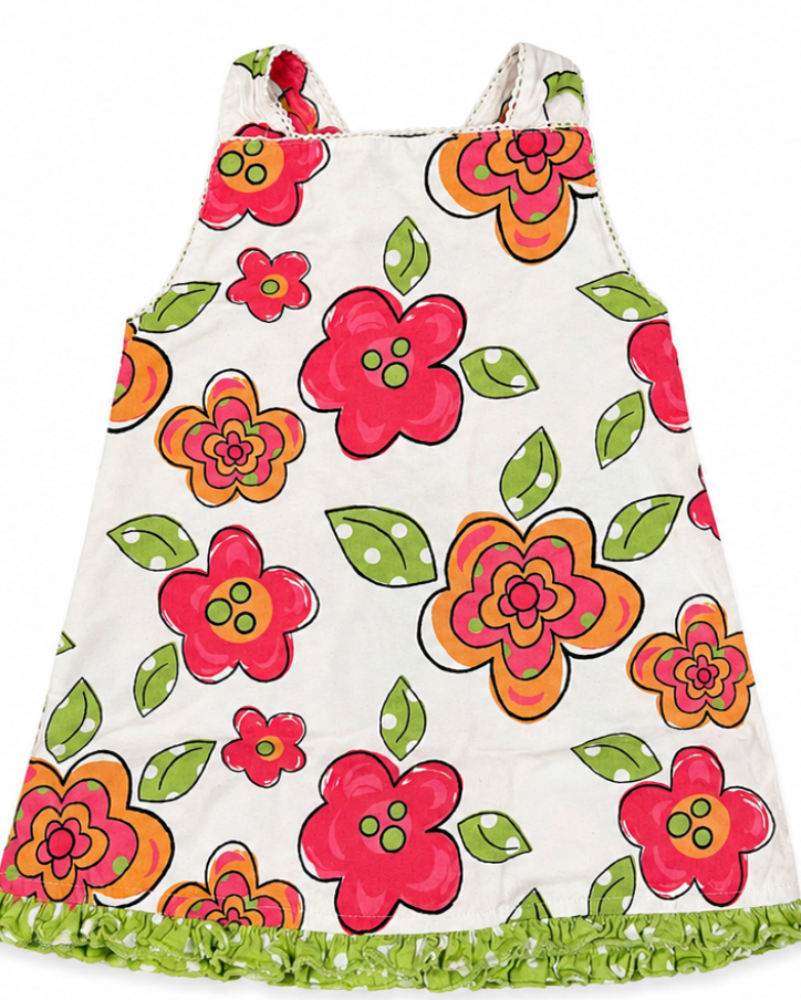 Children's dress with colorful floral pattern on a white background