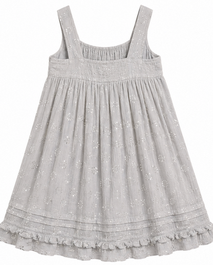 A light gray sleeveless dress with embroidered eyelet details, wide shoulder straps, and a ruffled hem, shown against a plain white background.