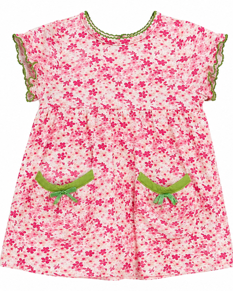 Pink floral dress with green trim on a white background