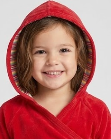A young child wearing a bright red hooded with a striped inner lining, photographed against a plain light gray background.