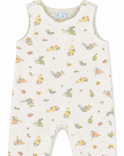 Baby romper with animal print on a white background