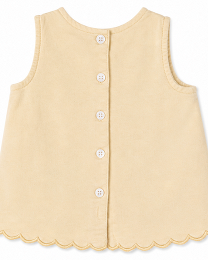 Yellow sleeveless button-up garment on a white background